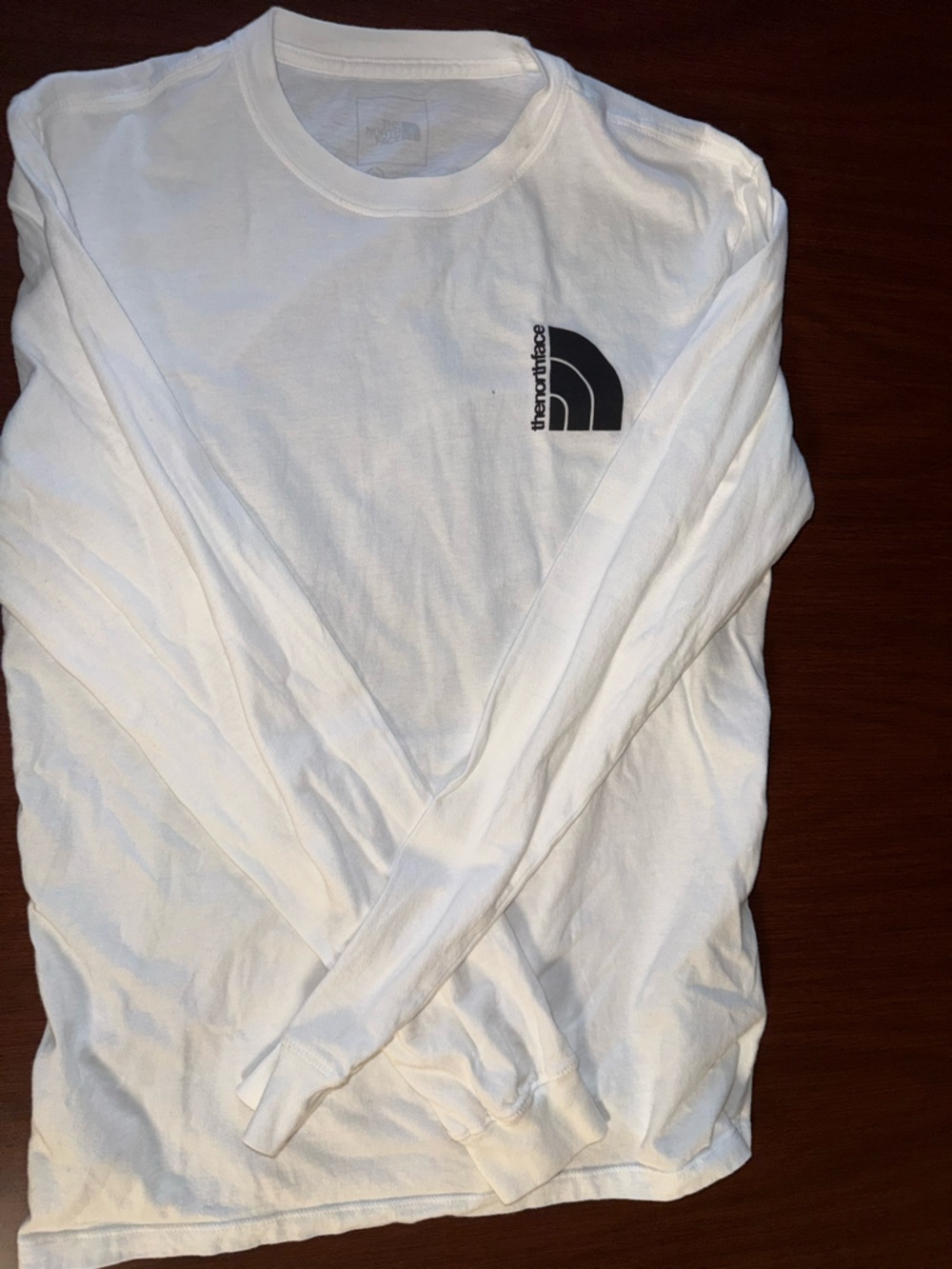 The North Face White Long Sleeve Shirt with Black Logo Accent